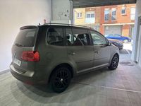 Usado VW Touran Advance 105 CV (77 kW) 2011 Verde Monovolumen