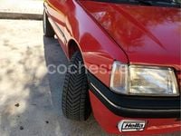 Usado Peugeot 205 80 CV (58 kW) 1990 Rojo Berlina