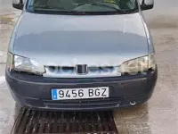 Begagnad Peugeot Partner Tepee Premium 90 HK (66 kW) 2009 Grå Minibuss