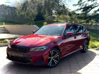 Käytetty BMW 330e Comfort Edition 292 HP (214 kW) 2025 Punainen Farmari