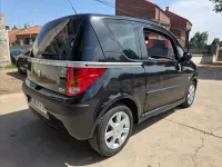 Usado Peugeot 1007 75 CV (55 kW) 2007 Negro Monovolumen