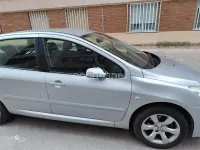 Usado Peugeot 307 90 CV (66 kW) 2006 Gris / plata Berlina