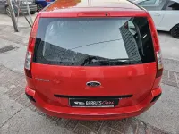 Usado Ford Fusion 80 CV (58 kW) 2010 Rojo Utilitario