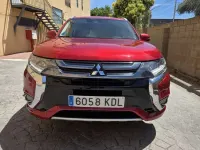 Usado Mitsubishi Outlander P-HEV 203 CV (149 kW) 2017 Rojo SUV