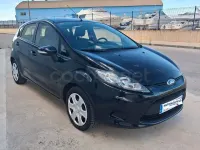 Usado Ford Fiesta Trend 68 CV (50 kW) 2010 Negro Berlina