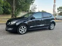 Usado VW Polo Advance 75 CV (55 kW) 2011 Negro Utilitario
