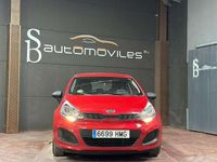 Usado Kia Rio 75 HP (55 kW) 2012 Vermelho Sedan