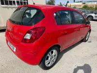 Usado Opel Corsa 95 CV (69 kW) 2011 Rojo Utilitario