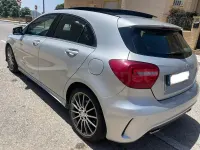 Usado Mercedes A180 AMG line 109 CV (80 kW) 2015 Gris / plata Utilitario