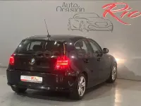 Usado BMW 118 Sport Line 143 CV (105 kW) 2011 Negro Utilitario