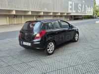 Usado Opel Corsa 75 CV (55 kW) 2009 Negro Utilitario