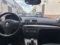 Usado BMW 116 122 CV (89 kW) 2009 Negro Utilitario