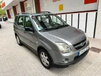Usado Suzuki Ignis 99 CV (72 kW) 2008 Gris / plata Utilitario