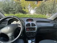 Używany Peugeot 206 75 KM (55 kW) 2004 Czarny Sedan/Limuzyna