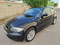 Usado BMW 118 143 CV (105 kW) 2010 Negro Utilitario