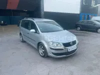 Usado VW Touran Advance 105 CV (77 kW) 2009 Gris / plata Monovolumen