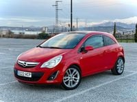 Usado Opel Corsa Selective 100 CV (73 kW) 2011 Rojo Utilitario