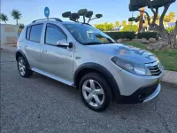 Usado Dacia Sandero Stepway 90 CV (66 kW) 2012 Gris Utilitario