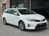 Käytetty Toyota Auris Hybrid Active 136 HP (100 kW) 2014 Valkoinen Farmari