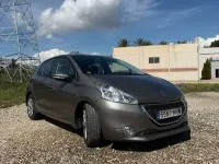 Usado Peugeot 208 Allure 68 CV (50 kW) 2013 Marrón Utilitario