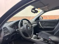 Usado BMW 116 122 CV (89 kW) 2009 Negro Utilitario