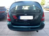 Usado Suzuki Liana 103 CV (75 kW) 2003 Verde Berlina