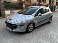 Usado Peugeot 308 Business-Line 92 CV (67 kW) 2011 Gris / plata Berlina