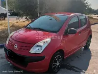 Usado Nissan Pixo Visia 68 CV (50 kW) 2009 Rojo Utilitario