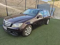 Usado Mercedes C200 136 CV (100 kW) 2010 Granate Familiar