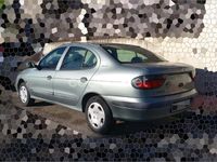 Usado Renault Mégane 90 CV (66 kW) 1997 Gris / plata Berlina