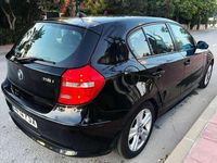 Usado BMW 116 122 CV (89 kW) 2007 Negro Utilitario