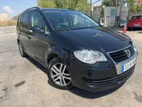 Usado VW Touran Highline 140 CV (102 kW) 2009 Negro Monovolumen
