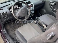 Usado Opel Corsa 80 CV (58 kW) 2005 Granate Berlina