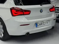 Używany BMW 118 150 KM (110 kW) 2016 Biały Hatchback