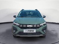 Używany Dacia Sandero Expression 111 KM (81 kW) 2023 Zielony Sedan/Limuzyna
