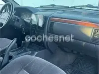 Usado Jeep Grand Cherokee Laredo 140 CV (102 kW) 1999 Azul SUV