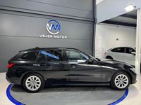 Usado BMW 320 184 CV (135 kW) 2021 Negro Familiar