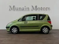 Usado Peugeot 1007 110 CV (80 kW) 2006 Verde Monovolumen