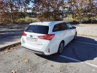 Käytetty Toyota Auris Hybrid Advance 136 HP (100 kW) 2014 Valkoinen Farmari