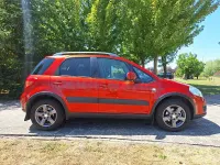 Usado Suzuki SX4 GL 135 CV (99 kW) 2012 Naranja SUV