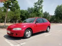Usado Mitsubishi Colt 103 CV (75 kW) 2003 Rojo Utilitario