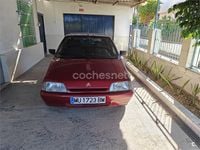 Usado Citroën AX Tonic 58 CV (42 kW) 1996 Granate Utilitario
