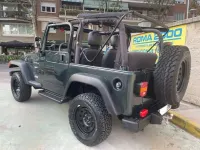 Usado Jeep Wrangler Sport 118 CV (86 kW) 2001 Verde SUV