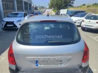 Usado Peugeot 308 SW 90 CV (66 kW) 2010 Gris / plata Familiar