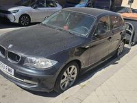 Usado BMW 116 122 CV (89 kW) 2007 Negro Utilitario