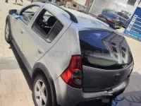 Usado Dacia Sandero Ambiance 75 CV (55 kW) 2013 Gris / plata Berlina