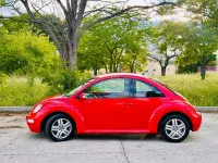 Usado VW New Beetle 102 CV (75 kW) 2006 Rojo Utilitario