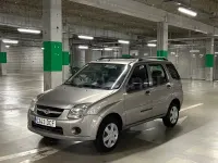 Usado Suzuki Ignis 69 CV (50 kW) 2005 Gris / plata Utilitario