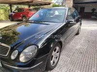 Usado Mercedes E320 Avantgarde 204 CV (150 kW) 2004 Negro Berlina