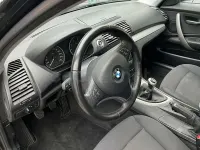 Usado BMW 116 122 CV (89 kW) 2008 Negro Utilitario